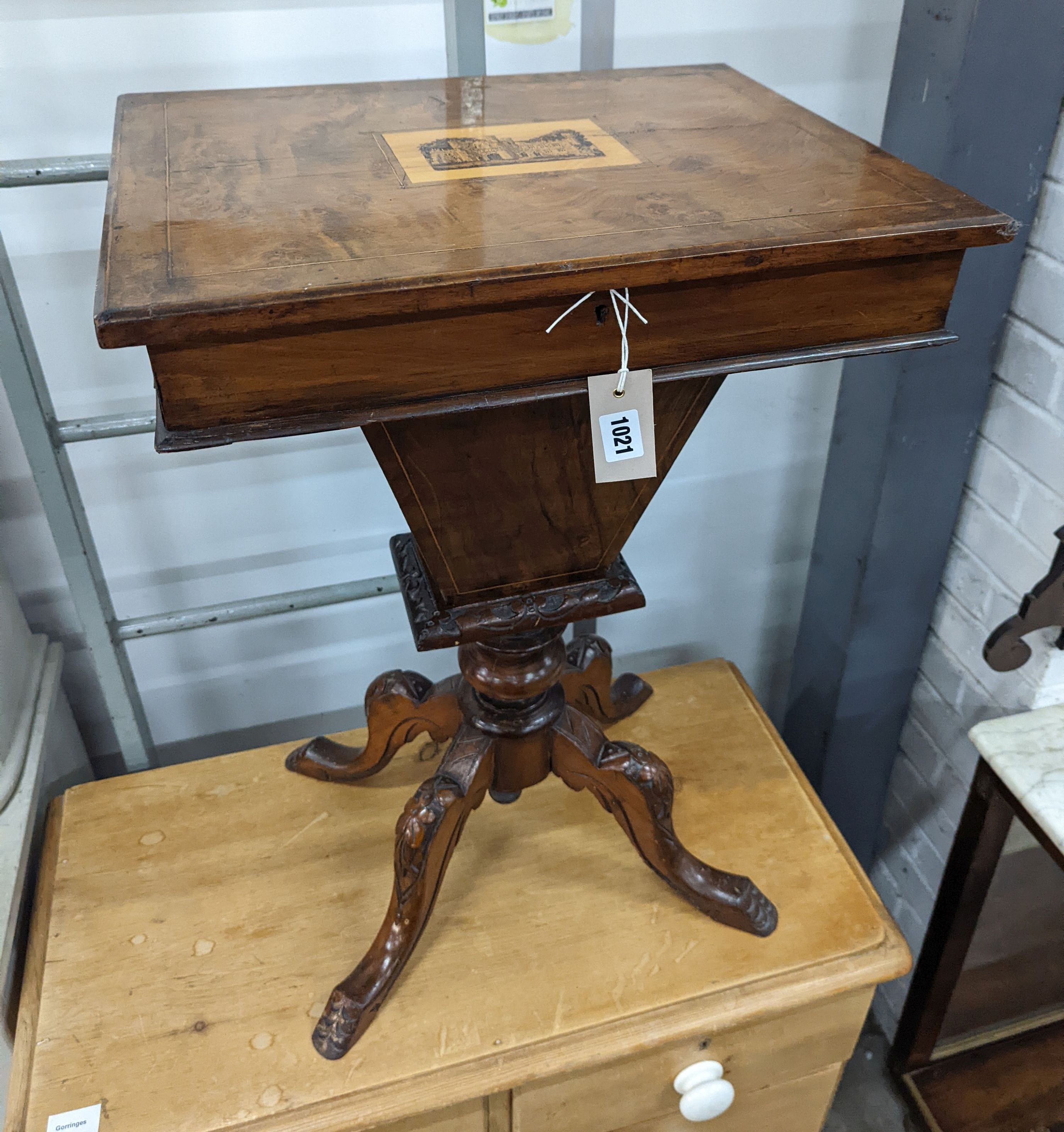 A Victorian walnut trumpet work table, the hinged top inset with a Tunbridge inlaid view of Eridge Castle, width 49cm, depth 38cm, height 72cm and a Regency satinwood banded mahogany bow fronted toilet mirror, width 46cm